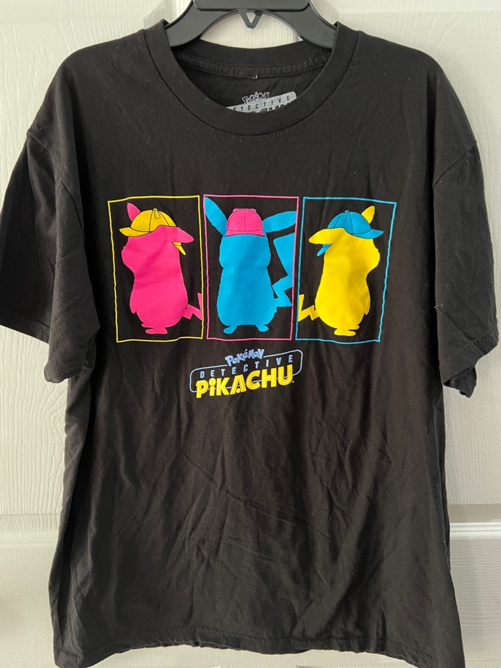 MAD Engine Black Detective Pikachu Tee with Pink, Blue, and Yellow Silhouettes